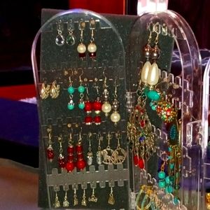 45 Pair of handmade earrings.  Unique, one of a kind.  Comes with Display.